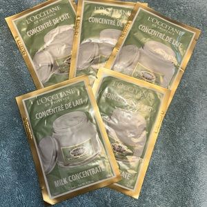 Bundle of 5 L'Occitane Almond Milk Concentrate packets.
